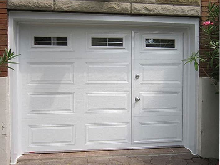 Garage door with pedestrian door